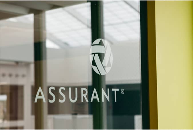 Assurant logo on glass conference room